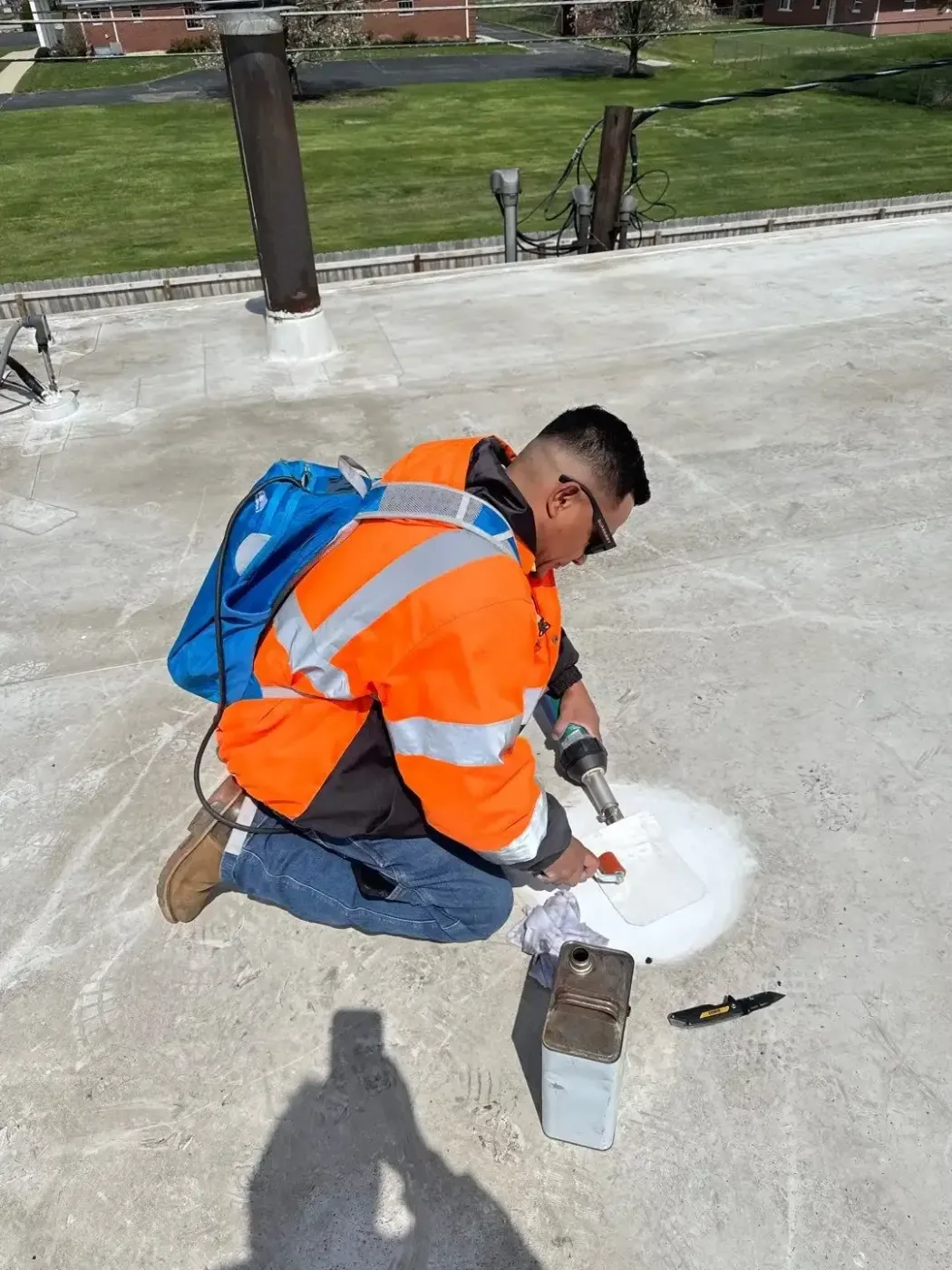 Reroofing around an operating facility